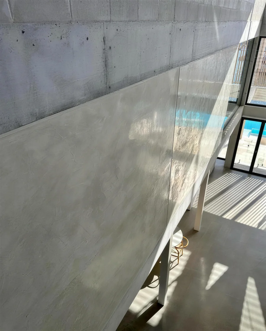 Polished plaster feature wall catching afternoon light